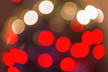 Background with bokeh defocused Christmas lights and stars.