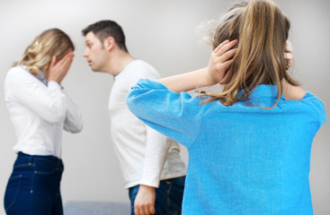 Parents quarreling at home, child in shock.