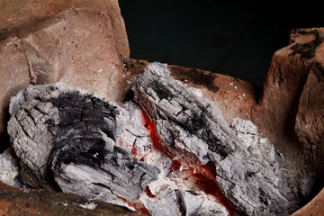 burning charcoal in old stove, thailand tradition