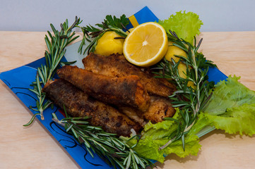 Fried fish with fresh herbs