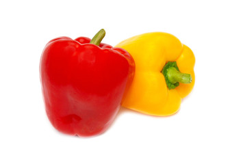 Red and yellow paprika isolated on white background