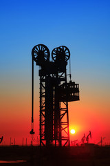 The silhouette of tower type pumping unit