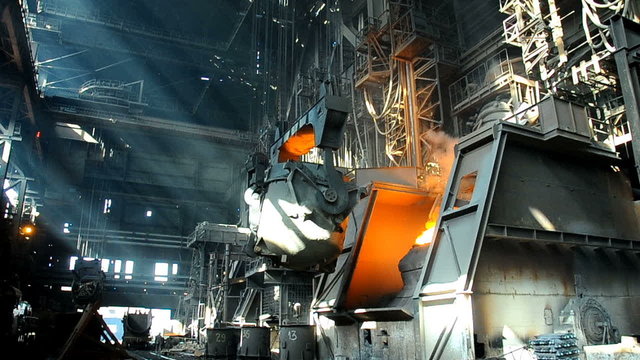 steel smelting in furnace at metallurgical works