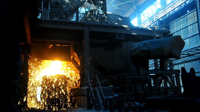 steel smelting in furnace at metallurgical works