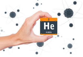 Helium element symbol handheld and atoms floating in background