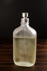 perfume bottle with black background