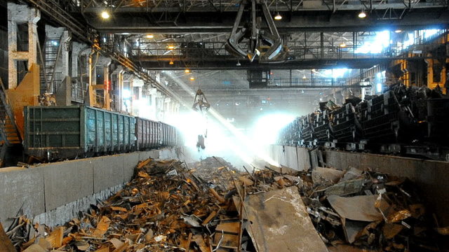 wagons with metal scrap unloading at steel plant