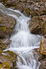 waterfalls in rocky mountain landscape