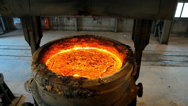  ladle full of molten metal at steel plant