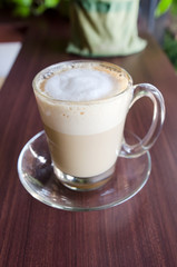 Half a cup of coffee in glass