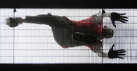 athlete runs on iron bridge