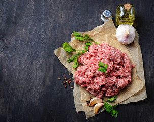Raw minced meat with olive oil and garlic