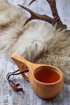 Tea in traditional finnish cup kuksa