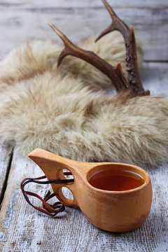 Tea in traditional finnish cup kuksa