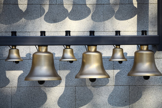 Various bells in a row
