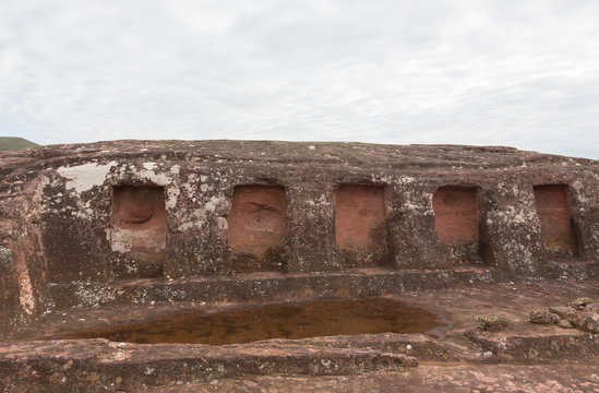 Close-up view of the niches cut in the rock in El Fuerte de Samaipata (Fort Samaipata)