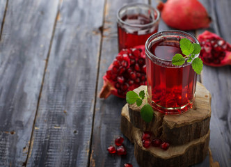 Glasses of red pomegranate juice