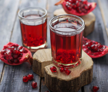 Glasses of red pomegranate juice