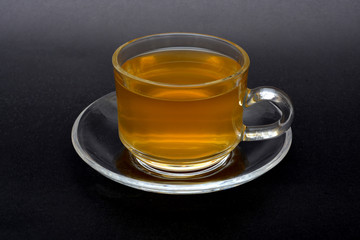Cup of Green Tea isolated on black background