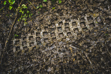the trail in the mud from the wheels of a motorcycle Enduro
