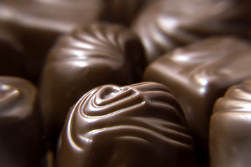 Macro closeup brown chocolate candy background