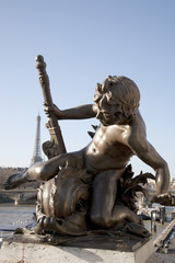 Figure on Pont Alexandre III Bridge in Paris, France