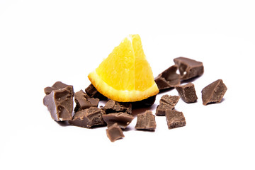 Orange and chocolate isolated on white