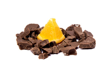 Orange and chocolate isolated on white