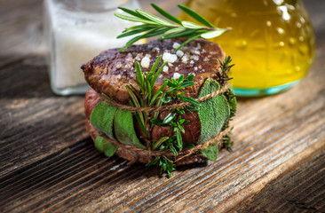 Grilled beef steak with herbs