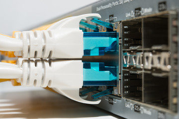 Patching cords connected to router close up