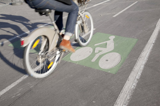 Cyclist on Bike Lane in Paris