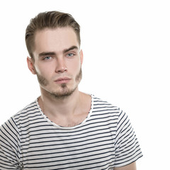 Fototapeta premium Portrait of young man, studio shot over white background, image