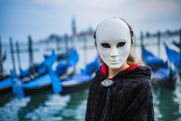Fototapeta na wymiar Carnival in Venice - in background San Giorgio Maggiore church Venice, Italy