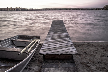 Northern Wilderness Lake. Aluminum rowboat on the shores of a remote northern wilderness lake in Michigan's Upper Peninsula.