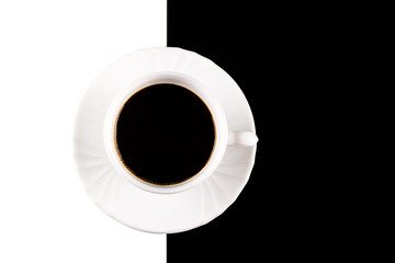 coffee cup on white and black background
