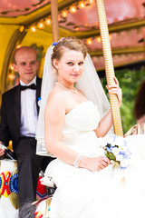 Bride and groom in a carriage