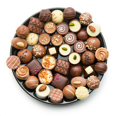 various chocolate pralines on plate