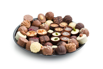 various chocolate pralines on plate