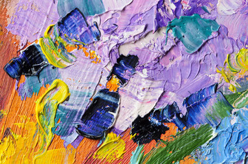 Artist's palette with mixed oil paints, macro, colorful stroke texture on canvas, studio shot, abstract art background 