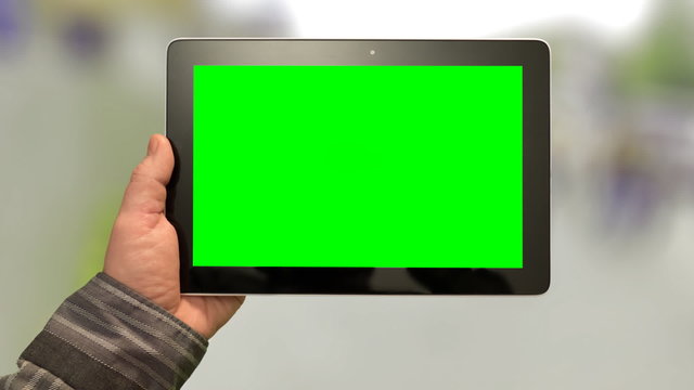 Walk with tablet PC, Green Screen on a green background. 
Easy for tracking and keying 