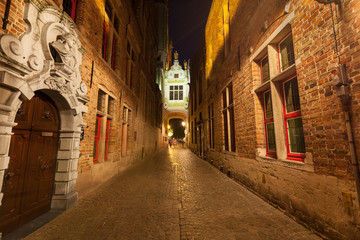 Fototapeta na wymiar Nigth view of Blinde Ezelstrat., popular alley in Bruges, Belgium