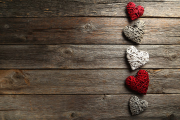 Love hearts on a grey wooden background