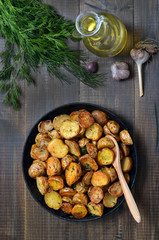 Roasted potatoes in frying pan