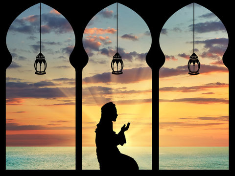  Silhouette of praying Muslim