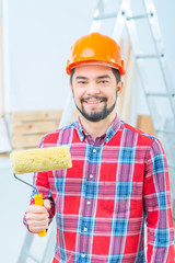 Handsome man doing renovation  