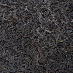 black tea leaves as a background