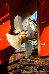 View of the  adjustment screw of the ship standing  on the dock in the Gdansk  Ship Repair Yard