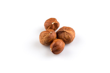 Hazelnuts on the white background