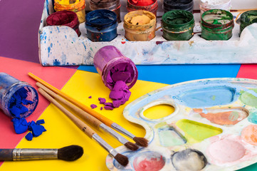 paints of in the box and a brush for drawing