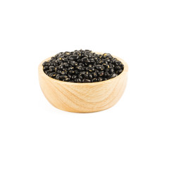 Seed black beans in wood cup isolated on white